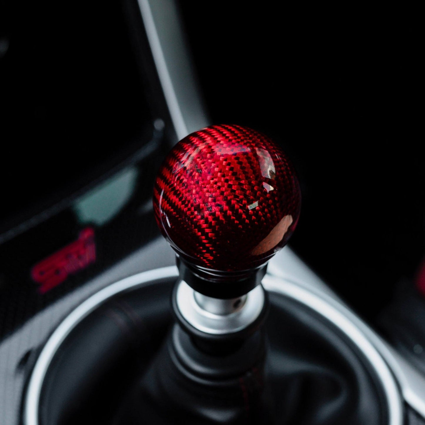 Weighted Red Carbon Fiber Shift Knobs Red Carbon / Light-Weight: 155 grams / 5.47oz. M12x1.25 Fits OEM Reverse Lockouts