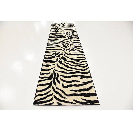 Abduljabaar Animal Print Beige/Black Area Rug Mercer41 Rug